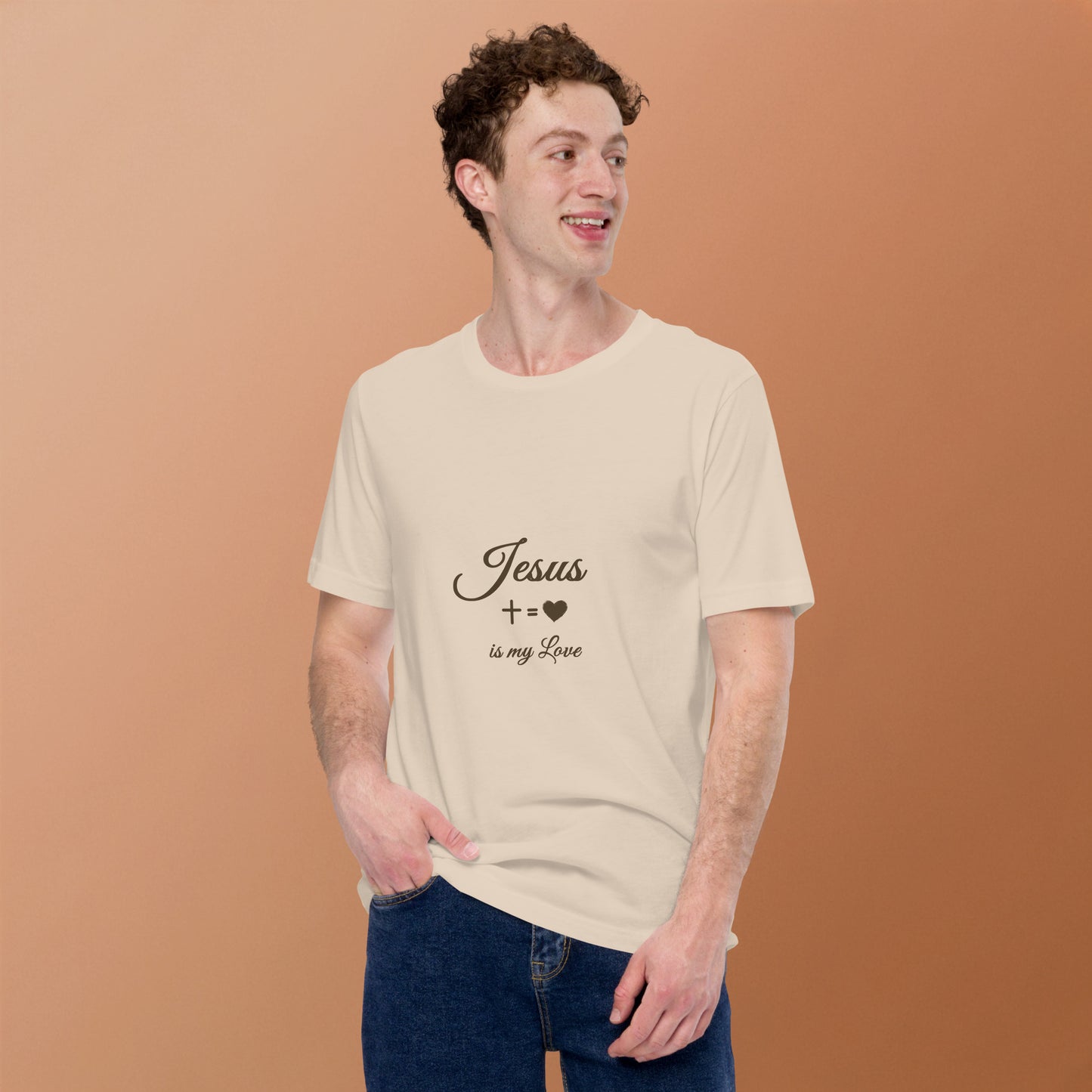 Man modeling Pure Love tee in studio, beige color with cross design — Holy Grace