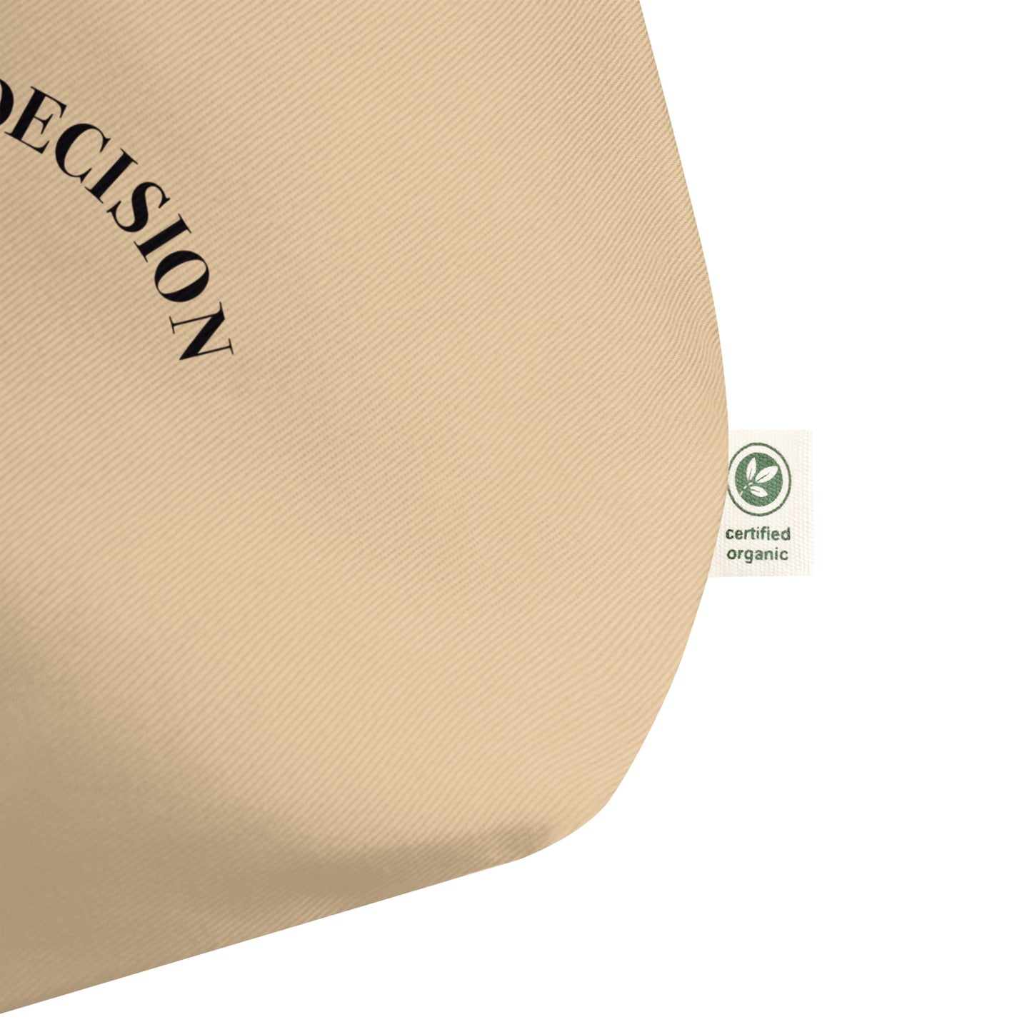 Eco-conscious label detail of beige Holy Grace tote bag “You Are My Best Decision” with Jesus face design.