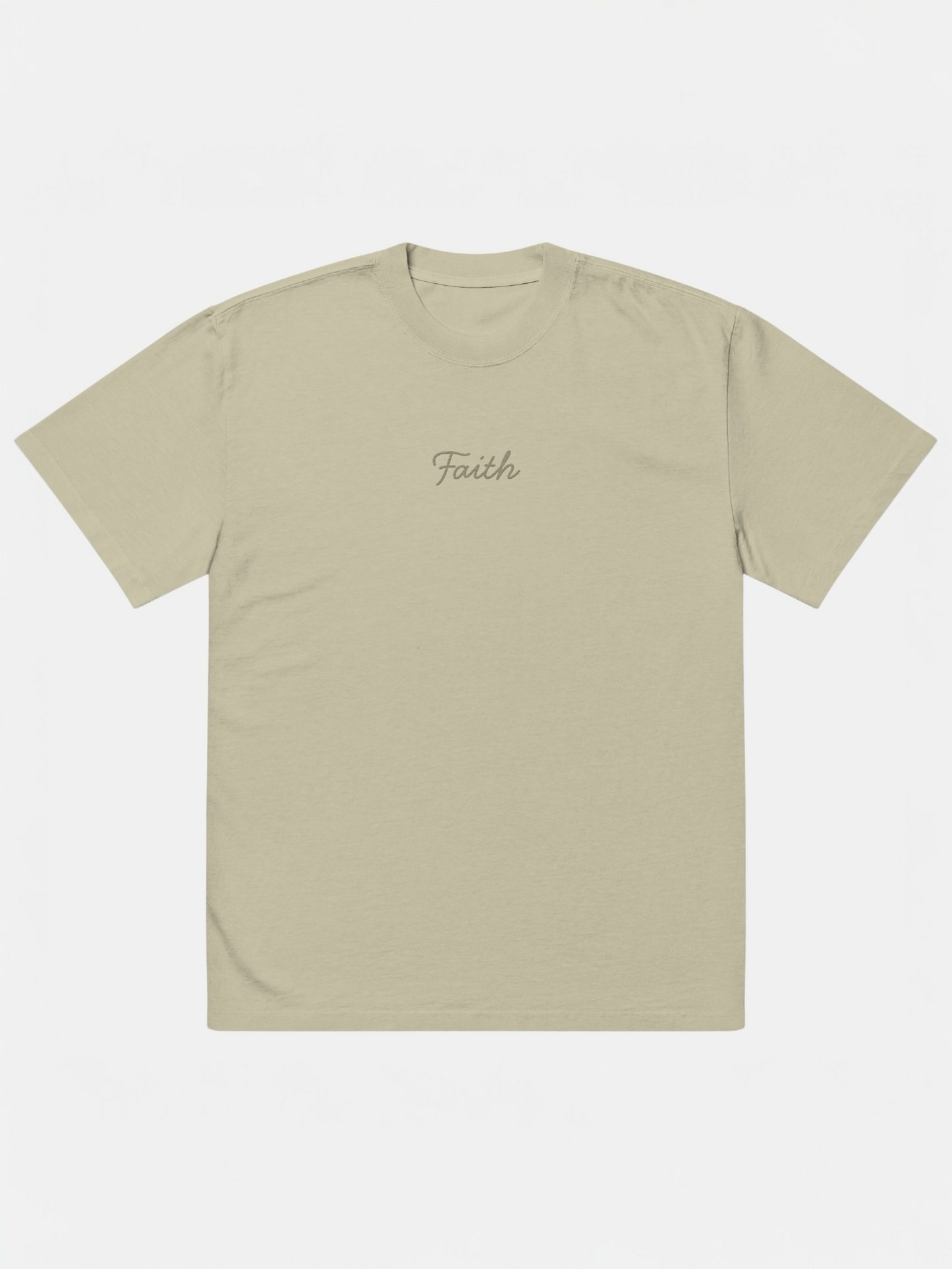 Beige t-shirt with 'Faith' embroidery on a white background